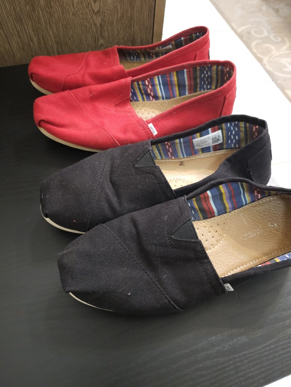 2 Pair Of Toms Women's Slip-On Canvas Loafers in Black and Red